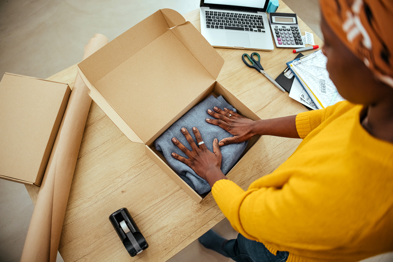 Seller packing clothes